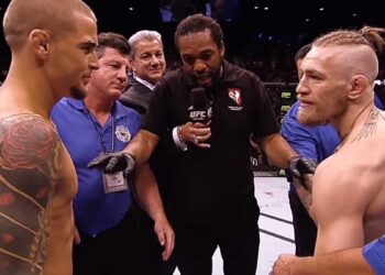 Dustin Poirier (L) and Conor McGregor (R) at UFC 178. Screengrab: UFC 257 Trailer, 'Ready For War'/UFC