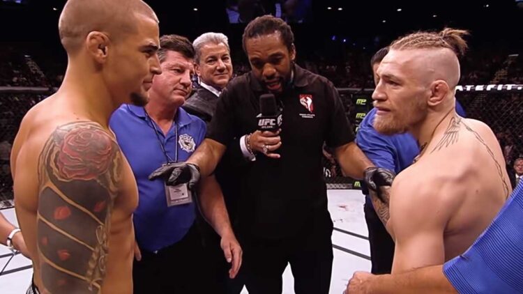 Dustin Poirier (L) and Conor McGregor (R) at UFC 178. Screengrab: UFC 257 Trailer, 'Ready For War'/UFC
