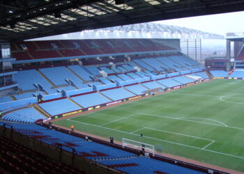 "The Trinity Road stand at Villa Park, home of Aston Villa Football Club" by Ben Sutherland is licensed under CC BY 2.0