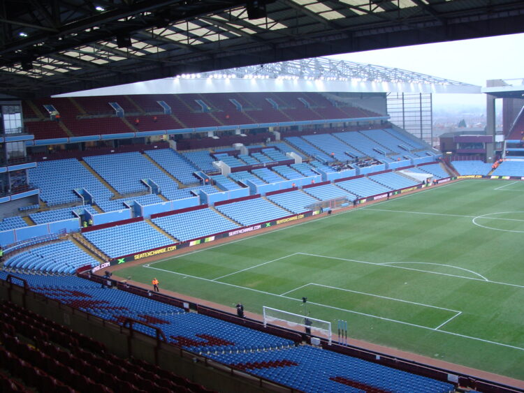 "The Trinity Road stand at Villa Park, home of Aston Villa Football Club" by Ben Sutherland is licensed under CC BY 2.0