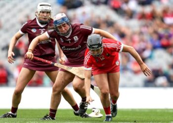 Cork's Amy O’Connor and Galway goalkeeper Sarah Healy. Photo: INPHO/Laszlo Geczo