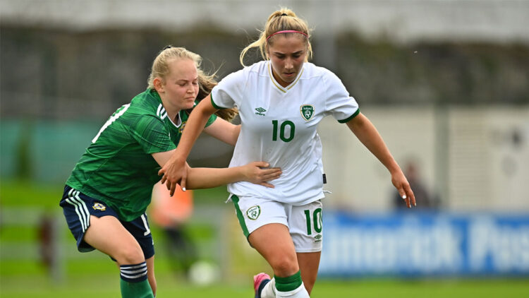 Ellen Molloy (in white) in action for Ireland's Women's U19s against Northern Ireland.