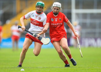 Derry's Caoimhe Glass with Lauren Callanan of Cork. Photo: ©INPHO/Evan Treacy