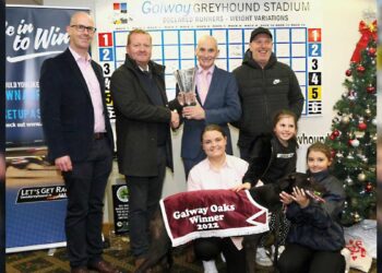 Derek Frehill, Director of Racing, Greyhound Racing Ireland, presents the winning trophy to Stephen Molloy, Oughterard, after Raha Mofo won The 2022 GRI Galway Oaks Final, at The Galway Greyhound Stadium. Also in photo are Oliver Hester, Racing Manager, Galway Greyhound Stadium, Murt Leahy, Trainer, Marissa Molloy, owner, with Féile and Ellie May Molloy.