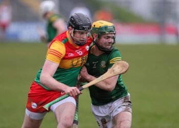 Carlow's John Doyle with Meath's Killiane Swaine. Photo: Pat Ahern/Carlow GAA