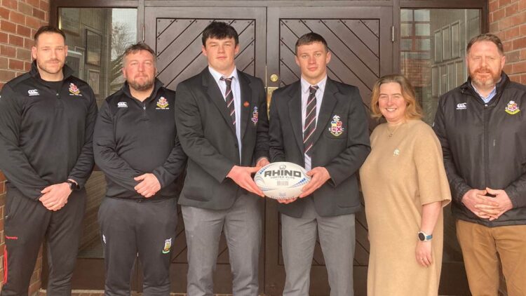 L-R: Kilkenny College senior coaches Mr. Swanepoel, Mr. Ashmore, Stephen Smyth, Sean Naughton, Ms. Raughter (principal) and Mr. Maloney (director of rugby). Photo courtesy Kilkenny College.