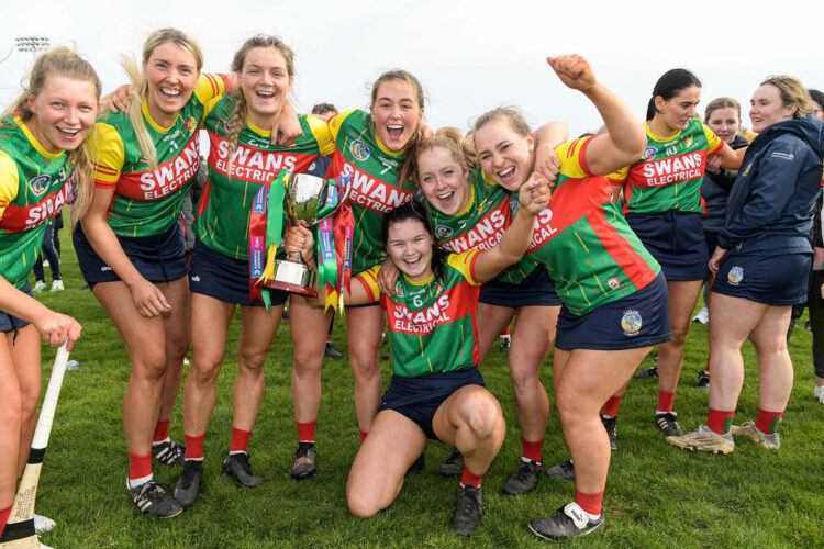 Carlow players celebrate with the trophy 8/4/2023