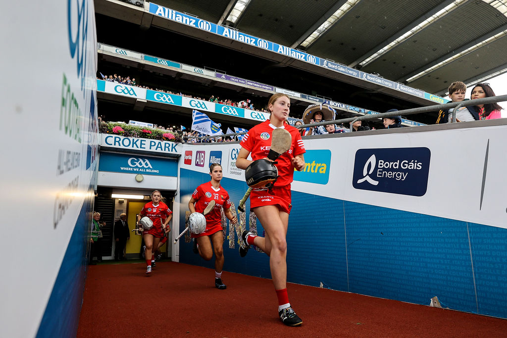 The Cork team run out out into Croke Park. Photo: ©INPHO/Ben Brady