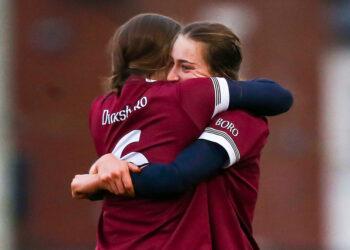 Dicksboro's Aobha O'Gorman celebrates with Caoimhe Dowling. Photo ©INPHO/Leah Scholes