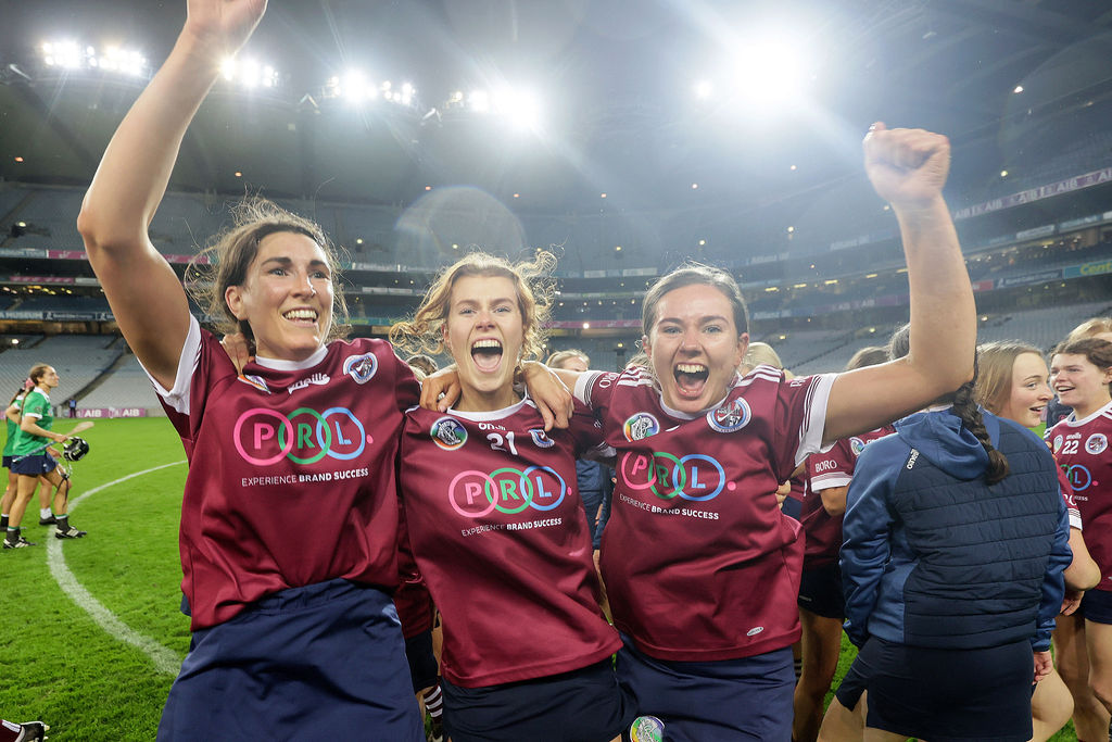 Lucinda Gahan, Caoimhe Carroll and Caoimhe Dowling celebrate after the game 17/12/2023
